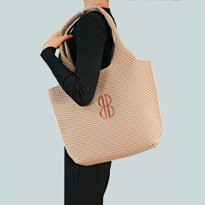 Sutton City Tote - Buckthorn Diamond Monogram draped on shoulder