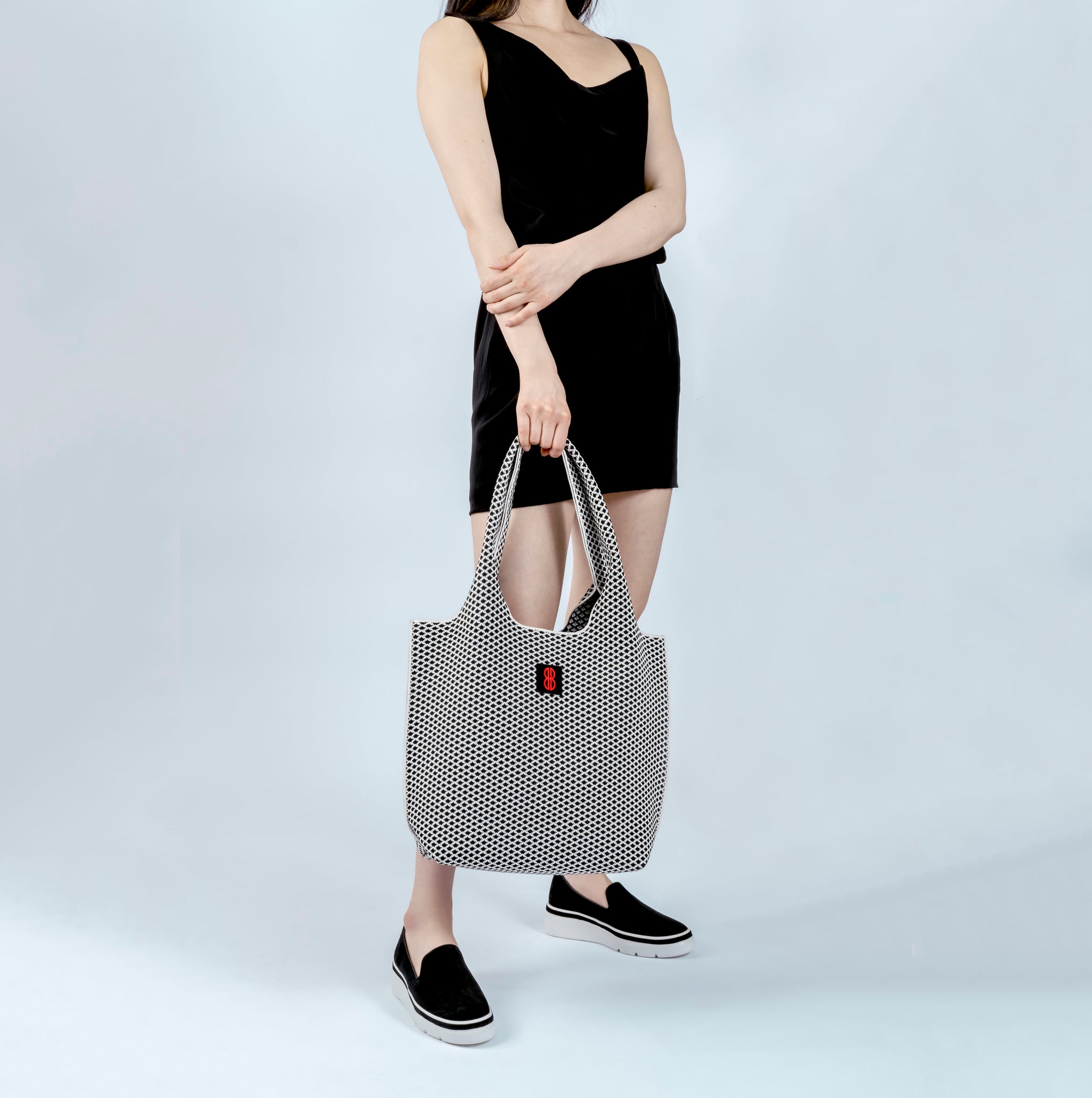 Black Diamond Tote held by hand