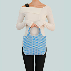 Sutton City Tote - Blue Diamond held by hands