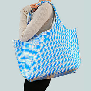 Sutton City Tote - Blue Diamond draped on shoulder