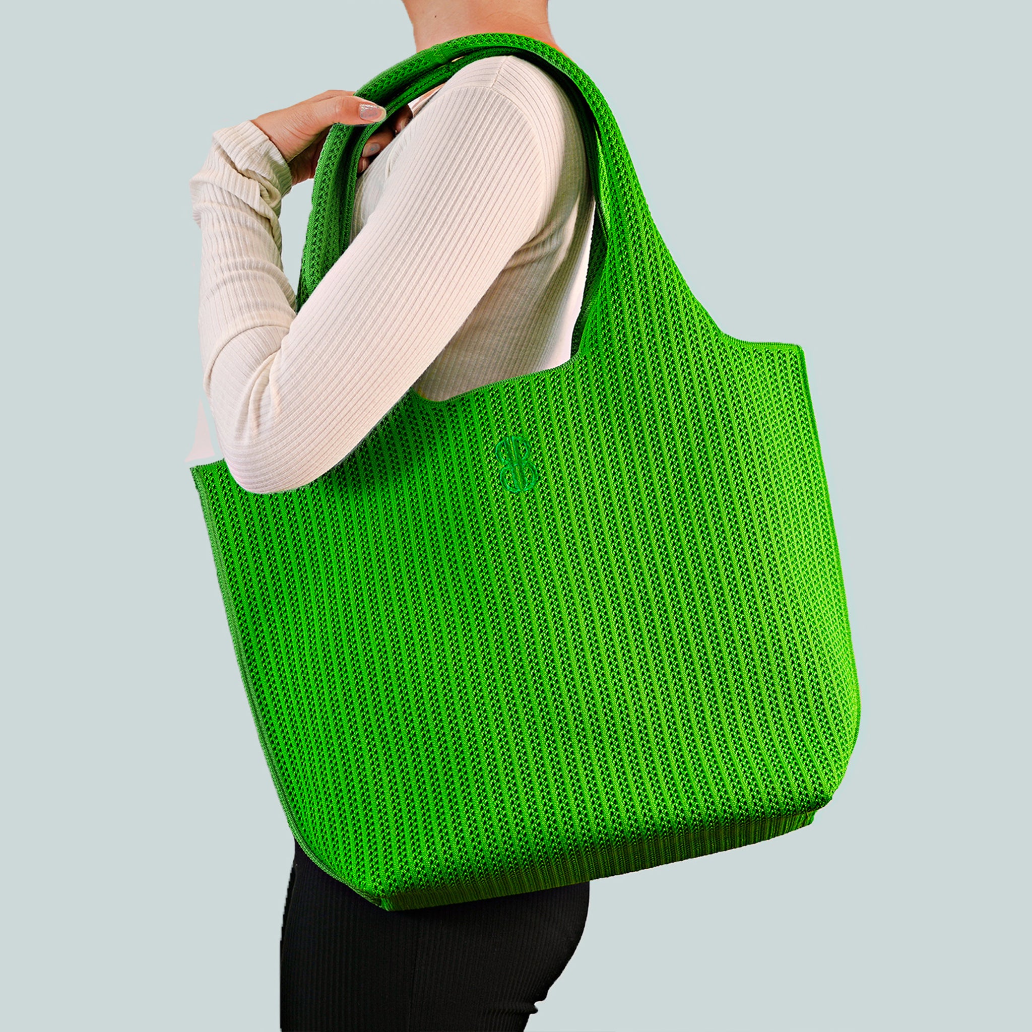 Sutton City Tote - Parakeet Green Stripe draped on shoulder