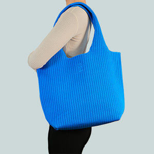 Sutton City Tote - Blue Stripe draped on shoulder