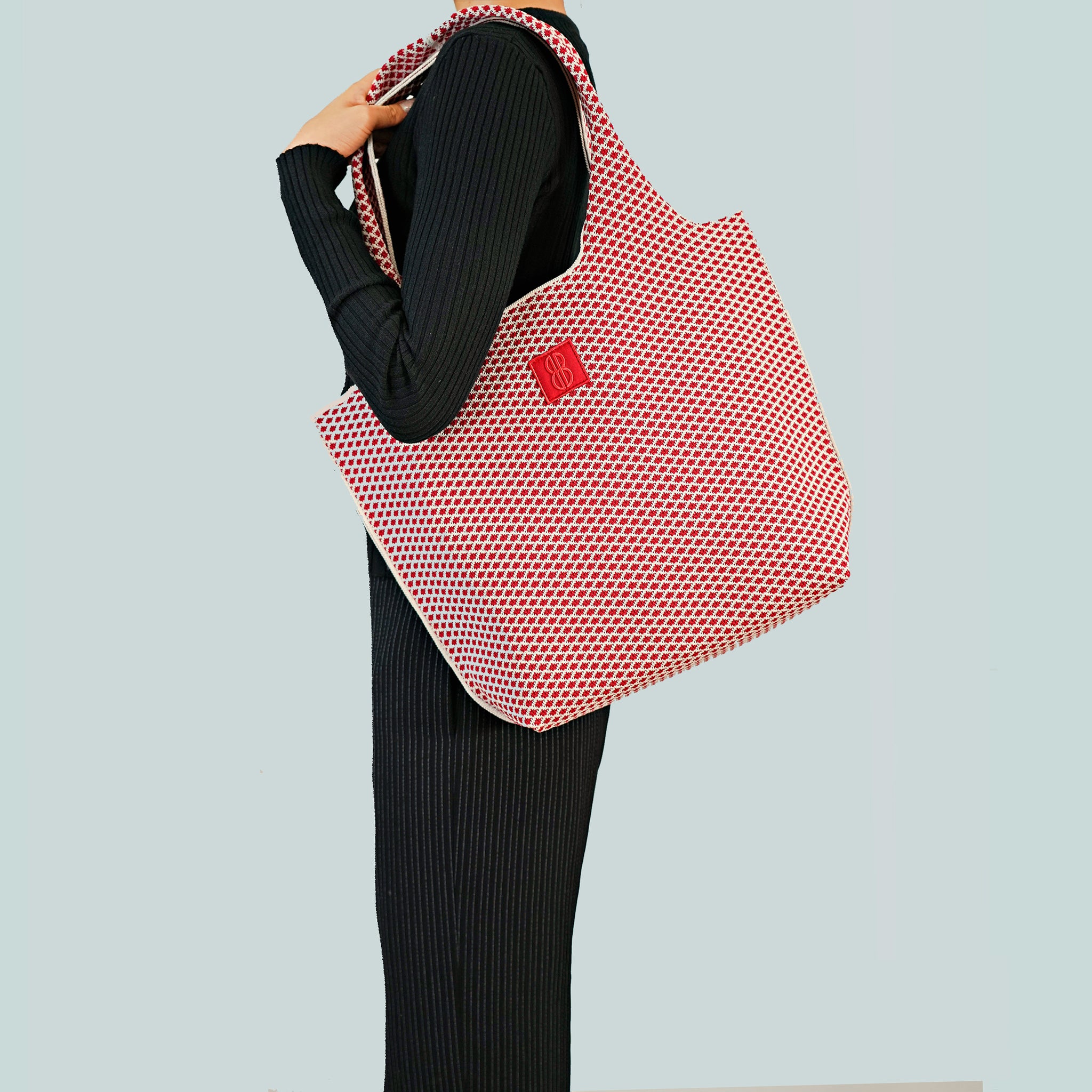 Red Diamond Tote draped over shoulder