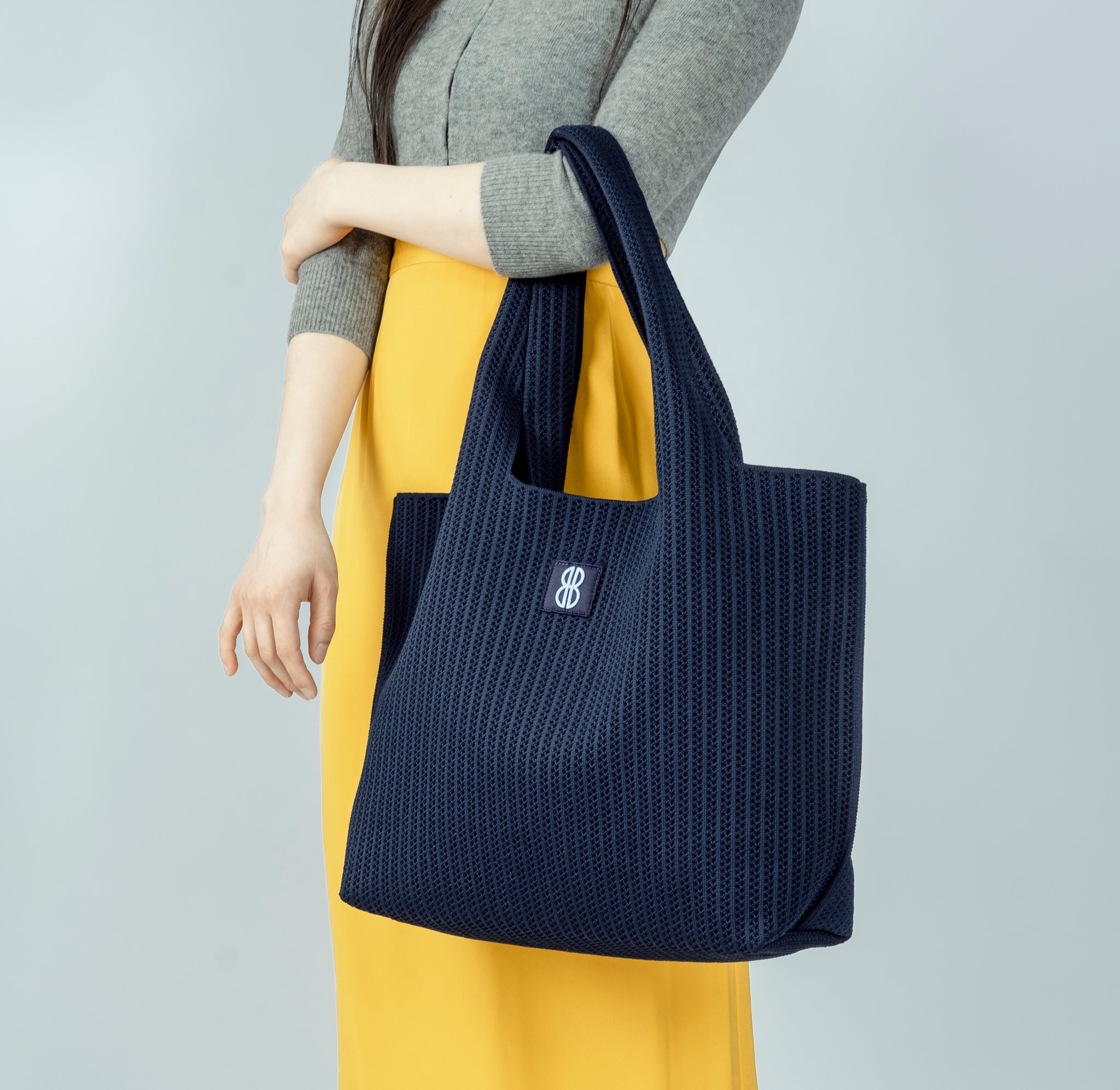 Navy Stripe tote on an arm