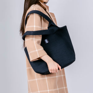 Navy Stripe Tote draped over shoulder