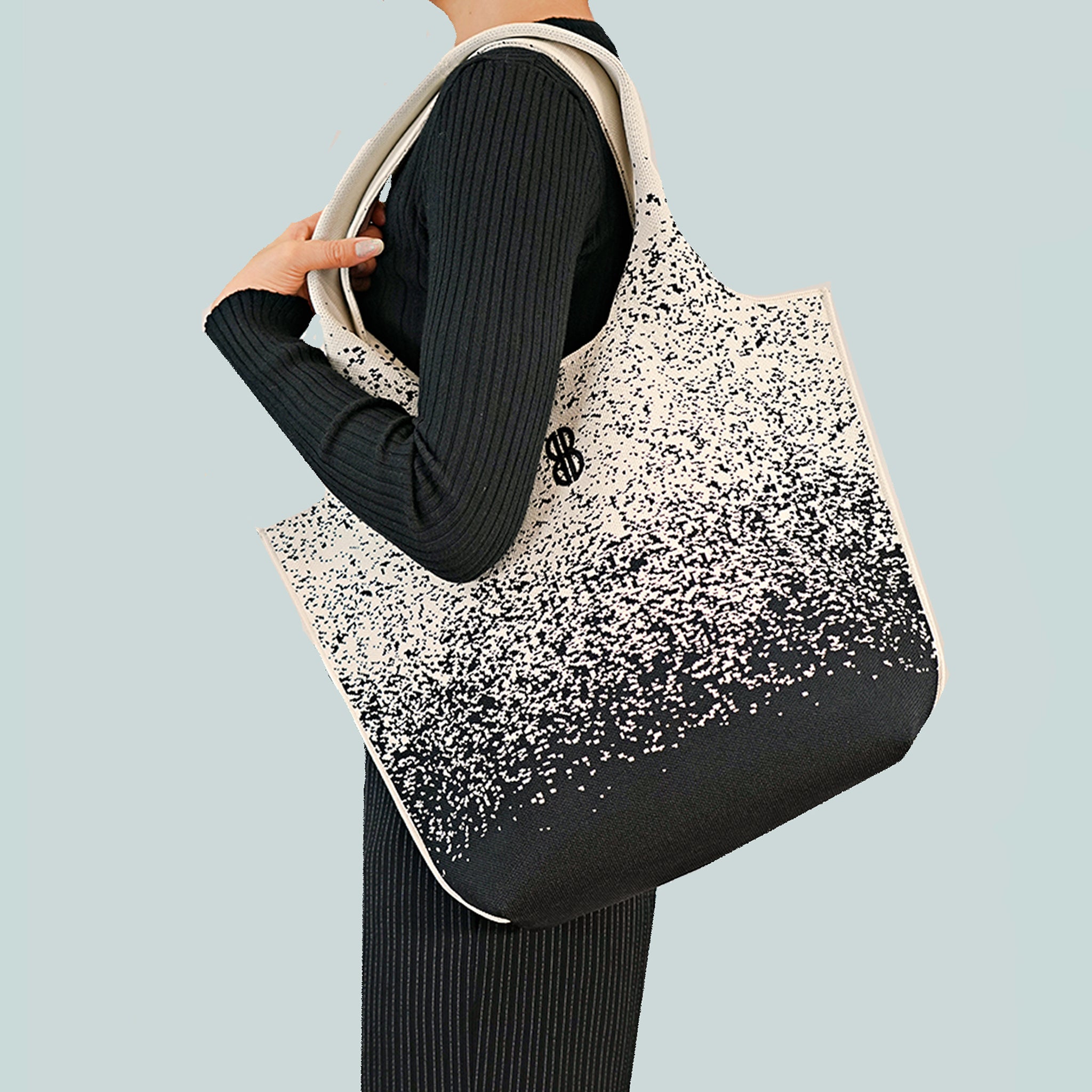 Sutton City Tote - Black Sprinkle draped on shoulder